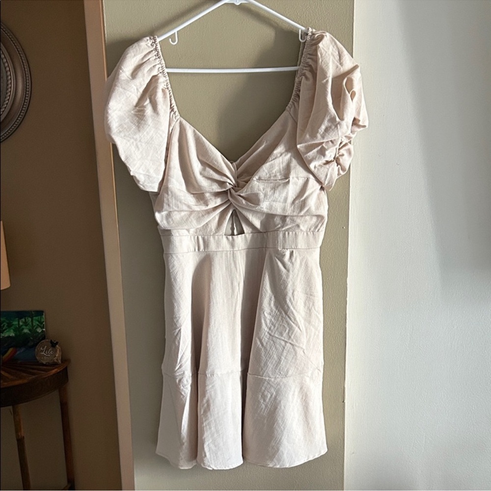 Trixxi Cream Puff-Sleeve Twist Front  Dress with side pockets.